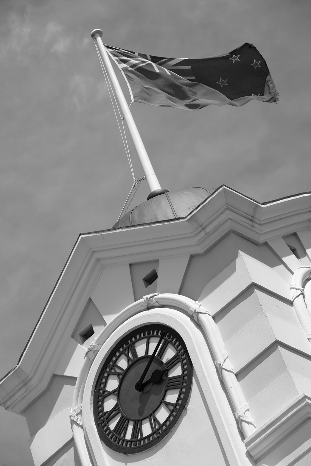 ponsonby clock tower with new zealand flag